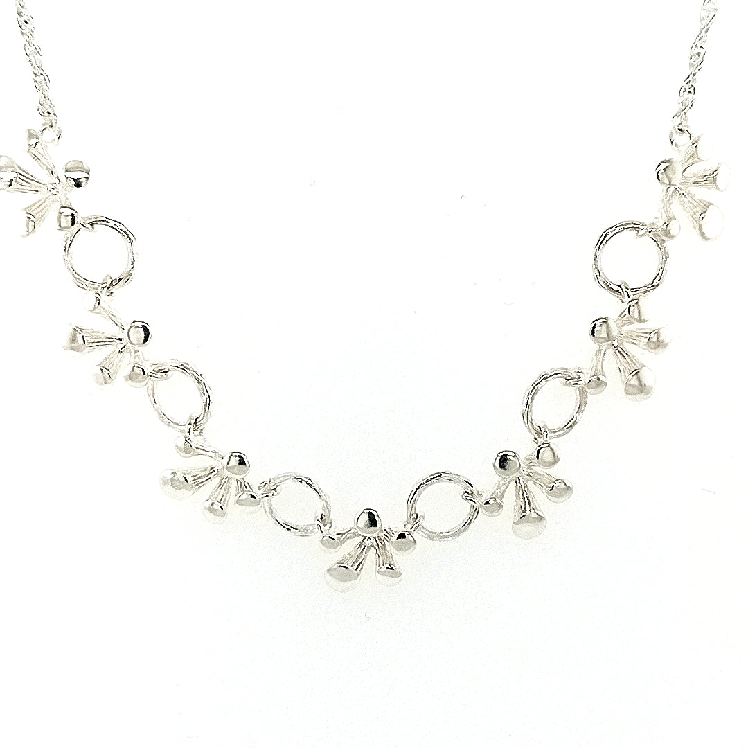 Silver Emerging Shoot and Ring Link Chain Necklace